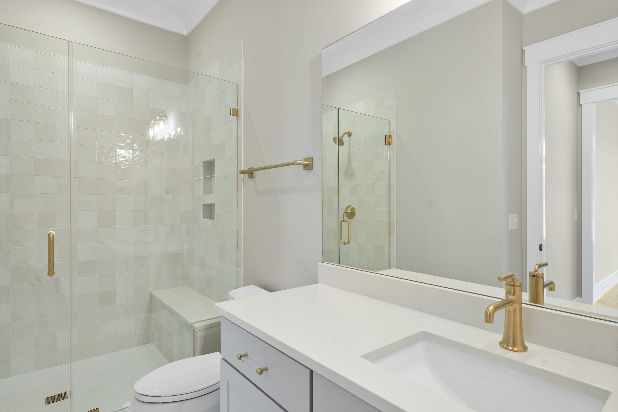 Spa-like primary bathroom design with walk-in shower and soaking tub